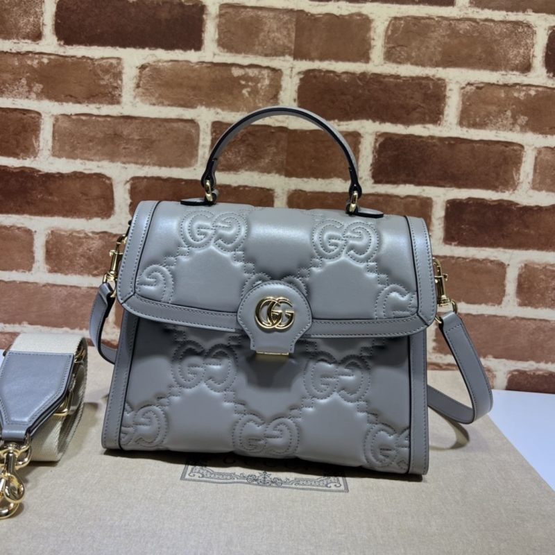 G*u*i top handle bags
